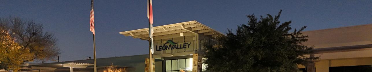 image of City Hall building lit up at night