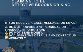 Aerial image of Leon Valley water tower with Scam alert notice 