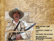image of American revolutionary man holding rifle over Declaration of Independence