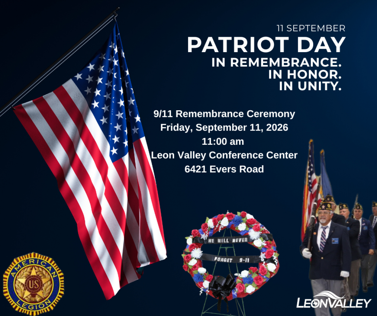 image of American flag and wreath in Red White Blue flowers and American Legion members for 911 ceremony 