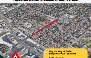 Notice of Huebner Rd lane closure impacting traffic near Elementary School with aerial map of road
