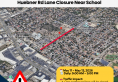 Notice of Huebner Rd lane closure impacting traffic near Elementary School with aerial map of road